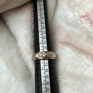 Two tone Sterling silver band ring with princess cut cz